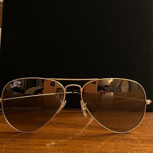 Ray Ban Aviator Sunglasses with polarized lens.